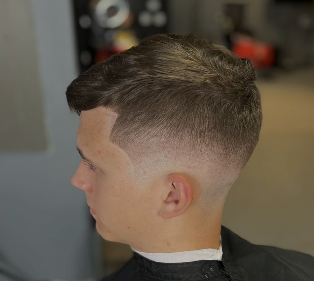 Clean skin fade finished by G The Barber